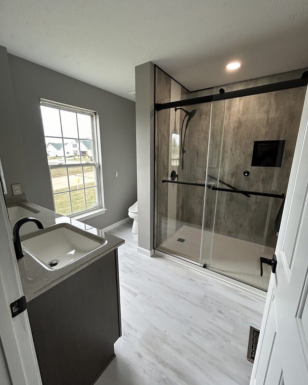 Cracked cement shower install by Made New Home Solutions